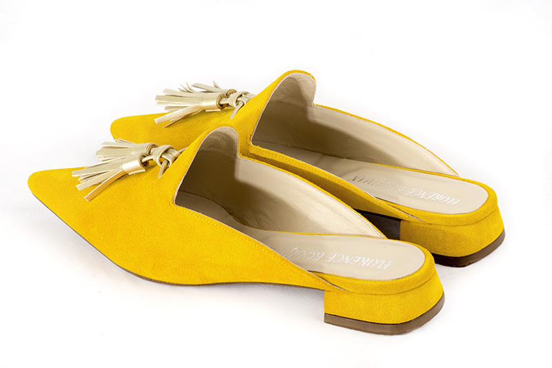 Yellow and gold women's loafer mules. Pointed toe. Flat flare heels. Rear view - Florence KOOIJMAN